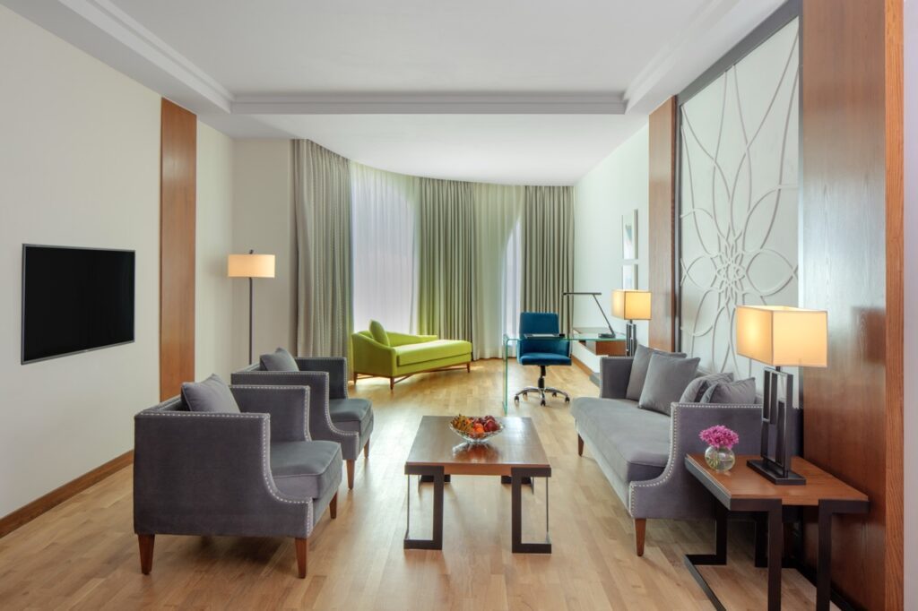 One-bedroom suite living room at Radisson Blu Mysore, furnished by HFS