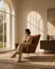 Trio Lounge Chair shown in a hotel interior with a seated guest