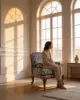 Anne Lounge Chair shown in a hotel interior with a seated guest