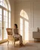 Cara Lounge Chair shown in a hotel interior with a seated guest