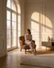 Gray Lounge Chair shown in a hotel interior with a seated guest