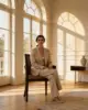 Ranchi Dining Chair shown in a hotel interior with a seated guest