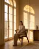 Sher Dining Chair shown in a hotel interior with a seated guest