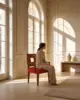 Square Back Dining Chair shown in a hotel interior with a seated guest