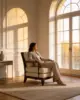 Tyler Lounge Chair shown in a hotel interior with a seated guest